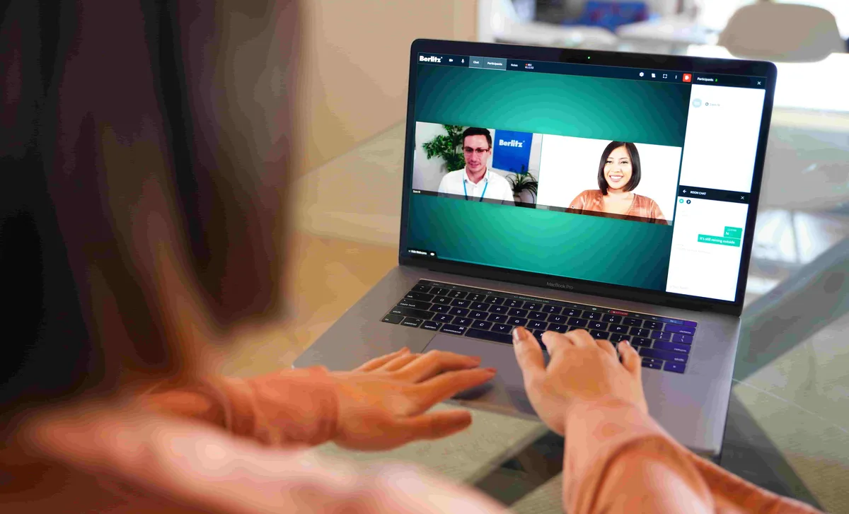 Student attending a Berlitz virtual language class from home, showcasing the convenience of flexible online courses with live instructors.
