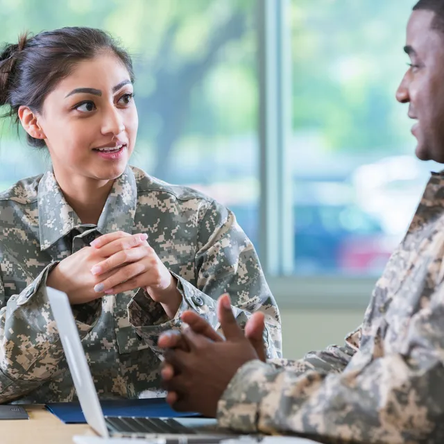 Two soldiers in conversation